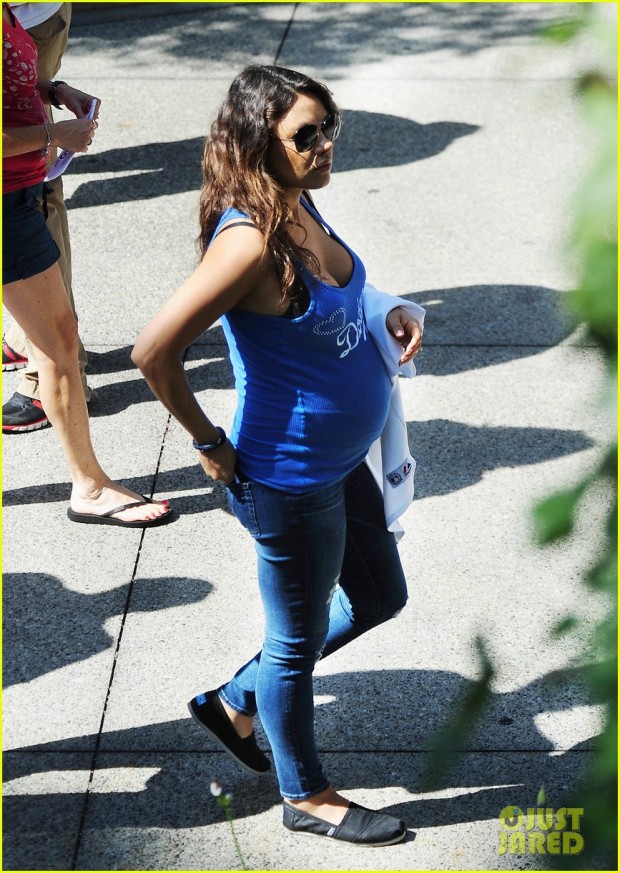 Mila Kunis and Ashton Kutcher take Mila's Baby Bump dressed in Dodgers blue to L.A. Dodgers Baseball Game