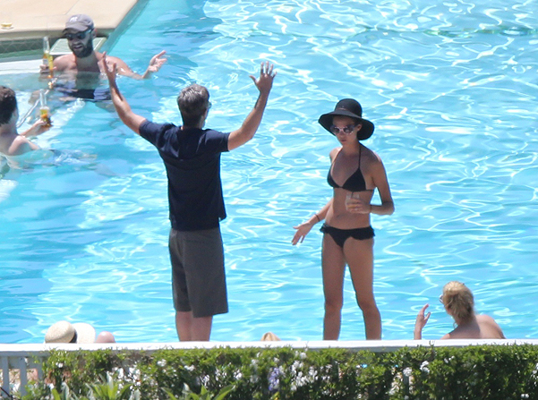 Jessica Simpson and Eric Johnson's wedding guests enjoy the pool on the 4th of July