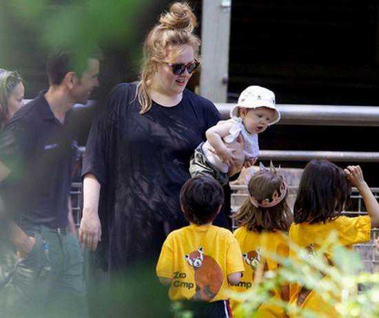 **EXCLUSIVE** Adele is seen doting over her adorable 8 month old baby boy Angelo during a trip to Central Park Children's Zoo in New York City
