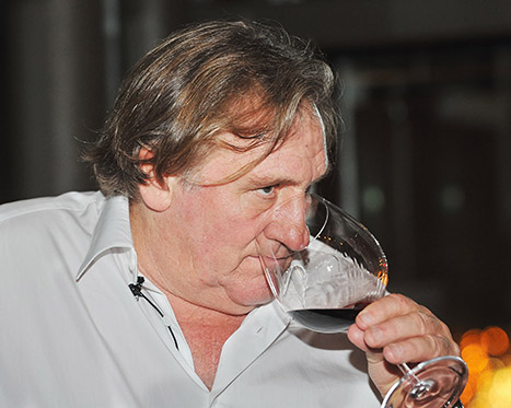 gerard-depardieu-wine-drinker-inline