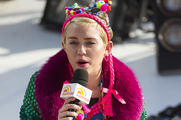 Miley Cyrus performs for 'Sunrise', at the opera house in Sydney, Australia