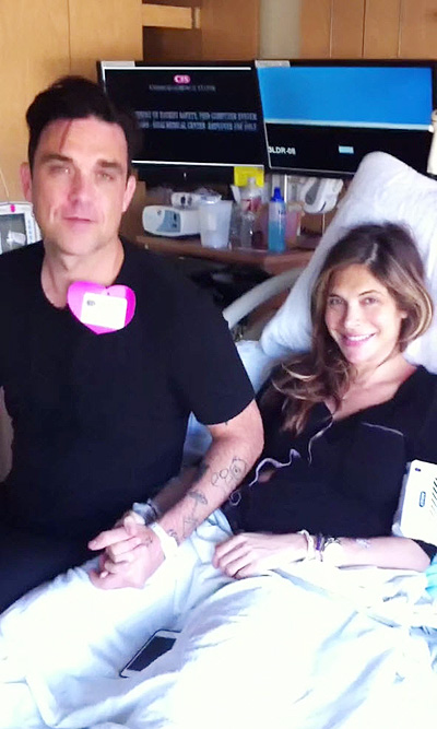 Robbie Williams and his wife, Ayda, thank viewers for sharing the journey of the birth of their baby boy with them in a clip on his Youtube channel Featuring: Robbie Williams,Ayda Field Where: Los Angeles, California, United States When: 28 Oct 2014 Cred