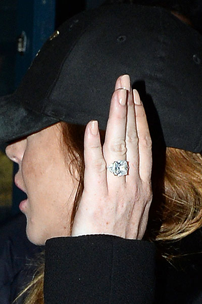 EXCLUSIVE: Lindsay Lohan sports a large ring on her engagement finger as she is spotted leaving Boujis nightclub in London
