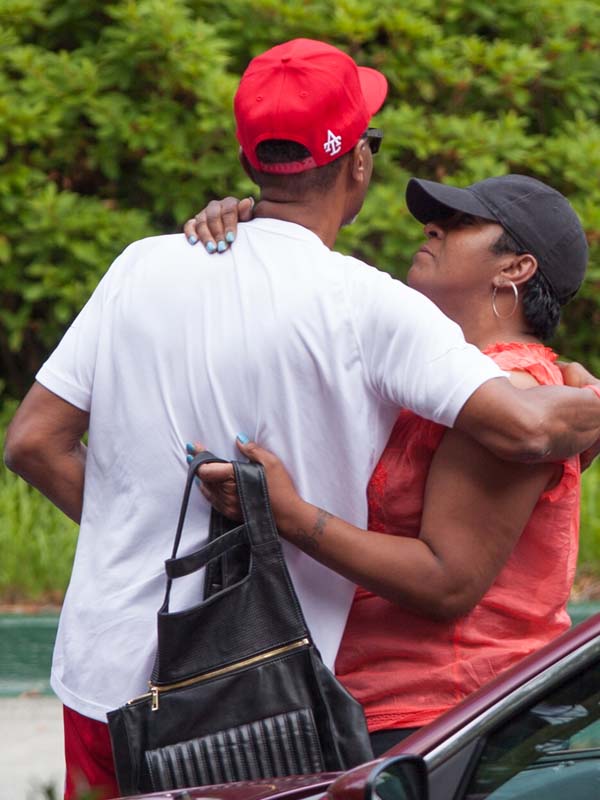 Bobbi Kristina Brown's family comfort each other at Peachtree Christian Hospice