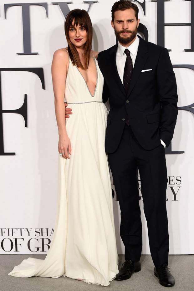 LONDON, ENGLAND - FEBRUARY 12:  Dakota Johnson and Jamie Dornan attend the UK Premiere of "Fifty Shades Of Grey" at Odeon Leicester Square on February 12, 2015 in London, England.  (Photo by Ian Gavan/Getty Images) 