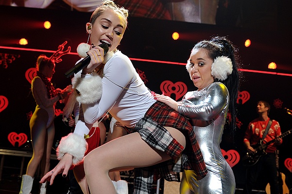 SUNRISE, FL - DECEMBER 20:  Miley Cyrus performs onstage during Y100's Jingle Ball 2013 Presented by Jam Audio Collection at BB&T Center on December 20, 2013 in Miami, Florida.  (Photo by Larry Marano/Getty Images for Clear Channel) 