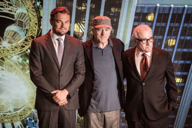 (L to R) US actor Leonardo Di Caprio, US actor Robert De Niro and US film director Martin Scorsese pose during a press conference ahead of the opening of the Studio City casino resort in Macau on October 27, 2015. Casino operator Melco Crown was to open its latest resort Studio City as the city scrambles to diversify from gambling to the mass-market amid falling revenues.  AFP PHOTO / Philippe Lopez 
