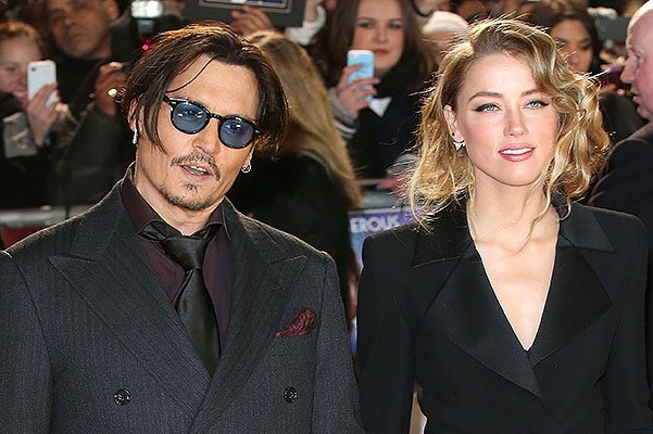 LONDON, ENGLAND - JANUARY 19:  Actor Johnny Depp and Amber Heard attend the UK Premiere of "Mortdecai" at Empire Leicester Square on January 19, 2015 in London, England.  (Photo by Tim P. Whitby/Getty Images) 