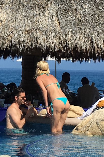 EXCLUSIVE: Tara Reid relaxes in a bikini at her hotel pool during a Mexican getaway