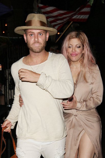 *PREMIUM EXCLUSIVE* Tori Spelling looks like she had a long night at The Abbey's with a mystery guy