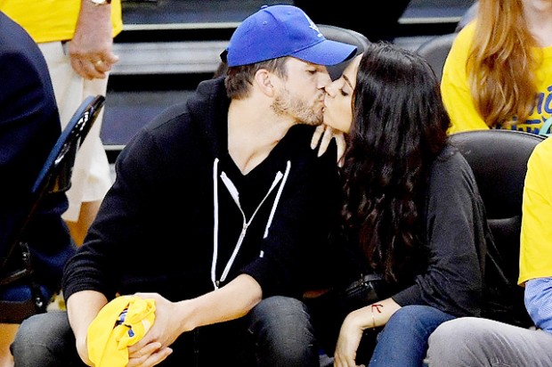 OAKLAND, CA - JUNE 05:  (L-R) Actors Ashton Kutcher and Mila Kunis attend Game 2 of the 2016 NBA Finals between the Golden State Warriors and the Cleveland Cavaliers at ORACLE Arena on June 5, 2016 in Oakland, California. NOTE TO USER: User expressly acknowledges and agrees that, by downloading and or using this photograph, User is consenting to the terms and conditions of the Getty Images License Agreement.  (Photo by Thearon W. Henderson/Getty Images) 