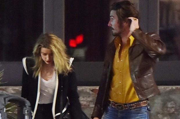 Amber Heard dines at the No Name club with a male companion