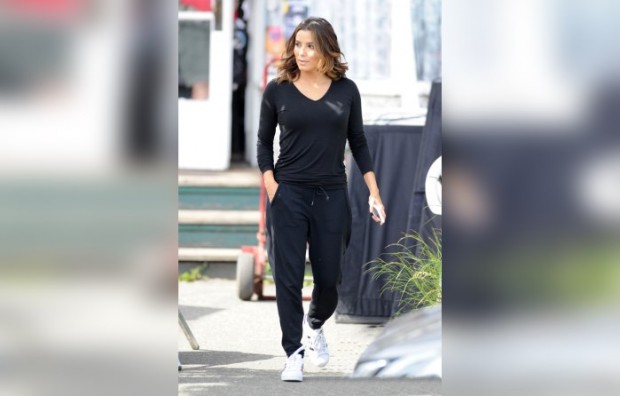 Eva Longoria wears a casual tracksuit as she arrives on set for Overboard in Canada