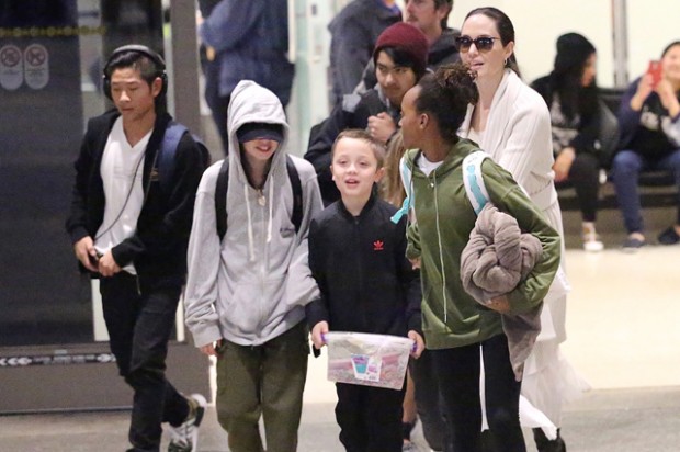 Angelina Jolie and her children arrive at LAX Airport in Los Angeles