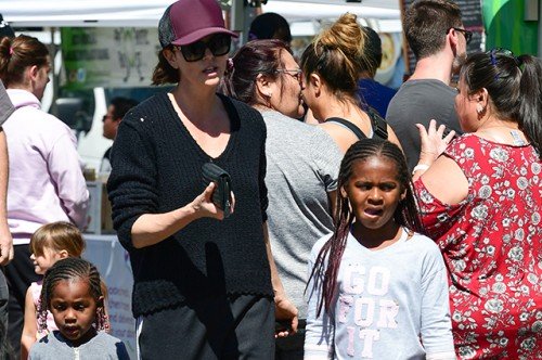 Charlize Theron out with kids