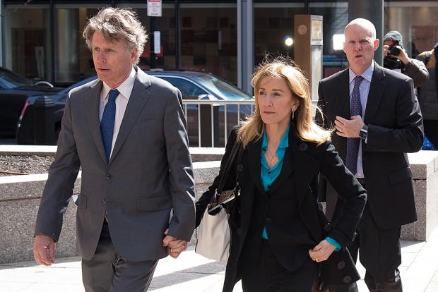 Felicity Huffman arrives to Federal Court in Boston today to face charges in a nationwide college admissions bribery scandal Pictured: Felicirty Huffman Ref: SPL5076809 030419 NON-EXCLUSIVE Picture by: Katy Rogers / SplashNews.com Splash News and Pictures Los Angeles: 310-821-2666 New York: 212-619-2666 London: 0207 644 7656 Milan: 02 4399 8577 photodesk@splashnews.com World Rights 