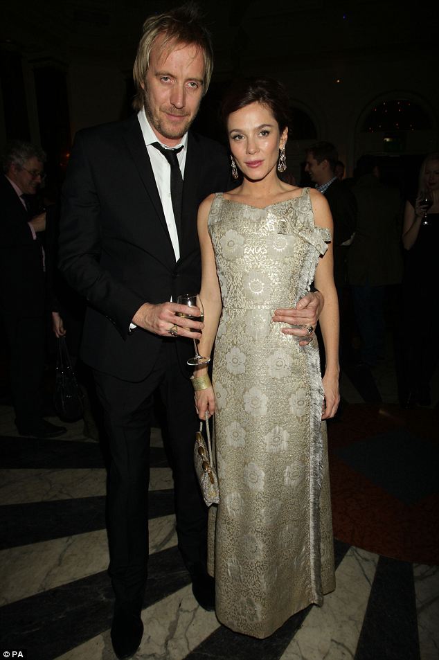 Proud: Anna's boyfriend Rhys Ifans made sure he didn't miss out on her big night 