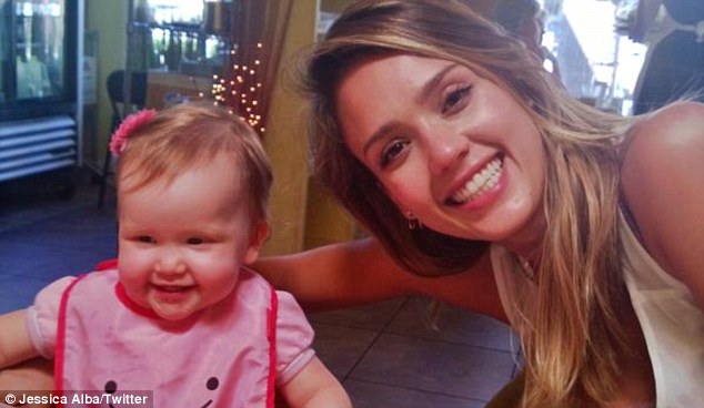 Cuddling up: Jessica later shared pictures of her two gorgeous girls on her Twitter page