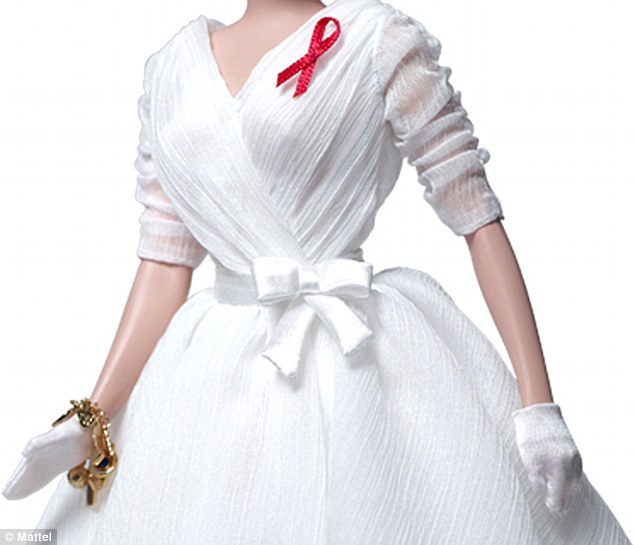 The outfit: The Elizabeth Taylor White Diamonds doll dons a white dress complete with a red satin ribbon to represent the extensive work the actress did for people living with HIV and AIDS