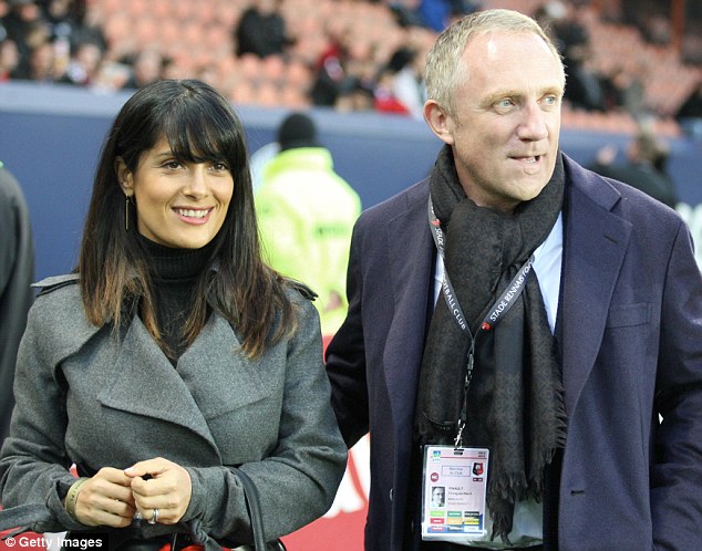 Football fans: The loved up pair seem to be having a great day watching Stade Rennes and Paris Saint-Germain FC