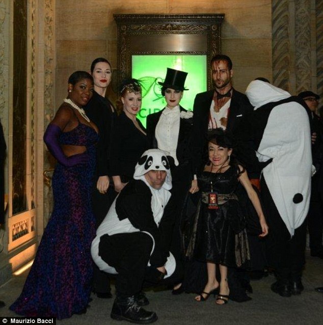 Dressed to impress: Dita and the other party goers showed off their elaborate costumes