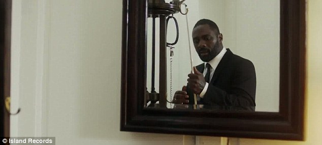 Idris Elba plays a blind man in the video
