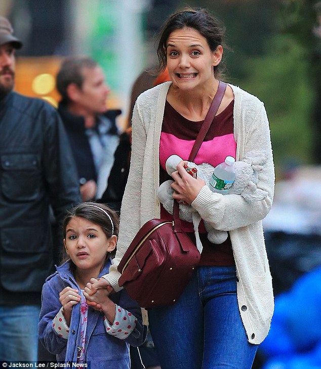 Yikes! Katie Holmes and her six-year-old daughter shared the same amusing grimace while out for ice-cream in New York Sunday