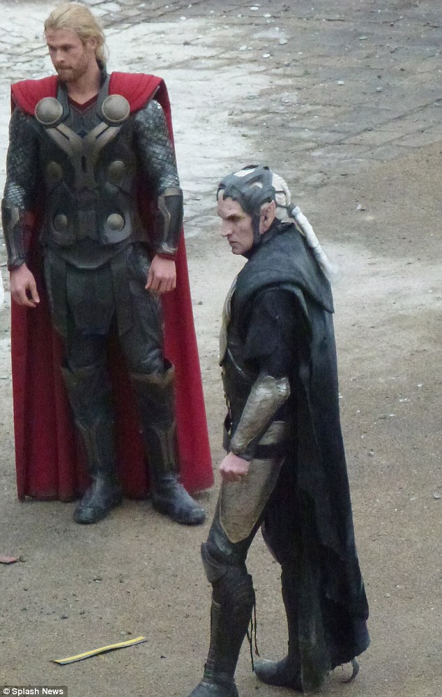 Heading to battle: Christopher Eccleston appears as the ferocious Malekith on the set of the new Thor movie on Friday when he filmed battle scenes with co-star Chris Hemsworth