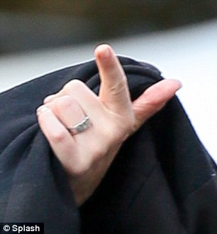 A lovely stone: Ronnie Wood and his new fianceé Sally Humphreys were seen showing off her engagement ring in Central Park, New York