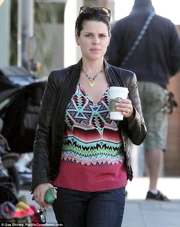 New baby, new bling? New mother Neve Campbell looked ready to make things official with her baby's father as she was seen wearing a sparkler on her left ring finger while grabbing coffee in Los Angeles Thursday