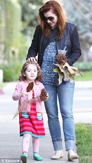 ALYSON HANNIGAN TAKES HER ADORABLE DAUGHTER SATYANA OUT