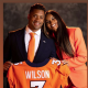 Сиара в ярко-оранжевом костюме на знаменательном спортивном событии Рассела Уилсона